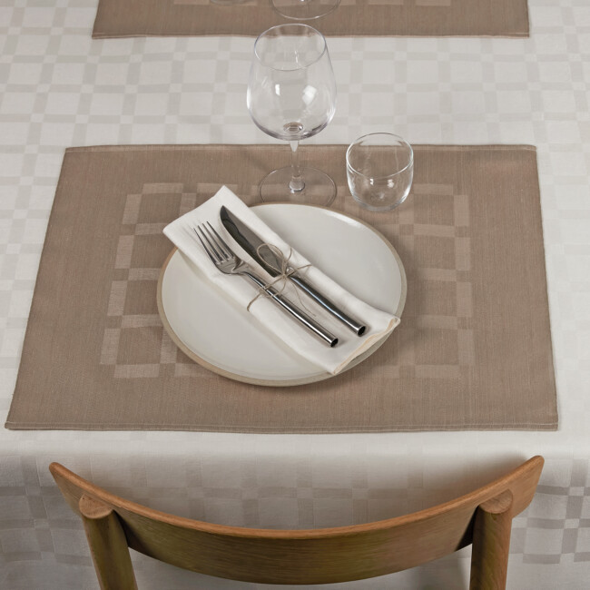 White Dylta linen tablecloth and unbleached placemat Klässbols